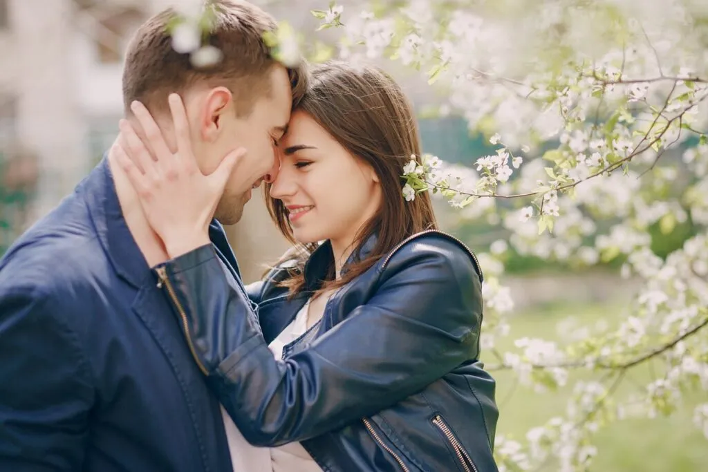 Confident man romantically holding his partner – benefits of penis enlargement